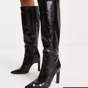 Black leather Knee High Boots.